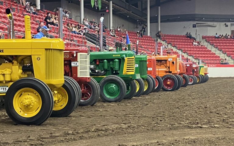Third generation vintage tractor puller pulls out victory at Stampede